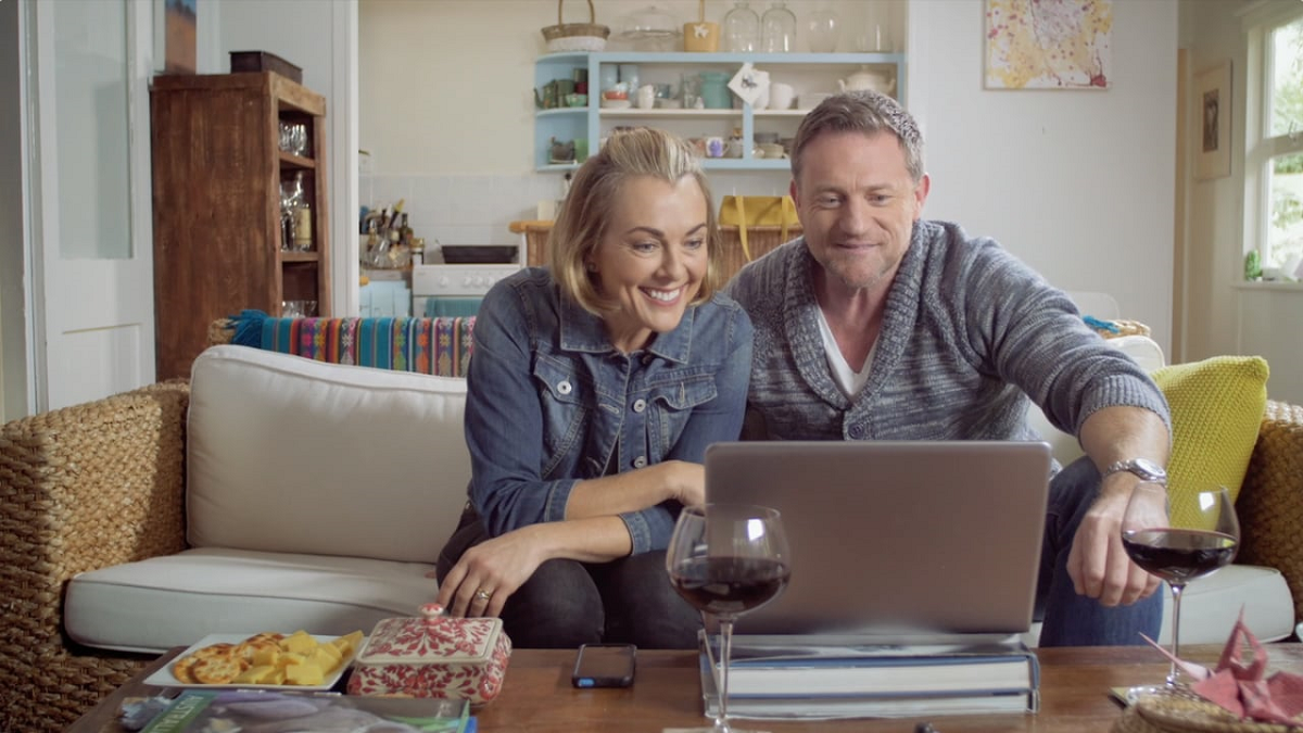 Couple watching laptop